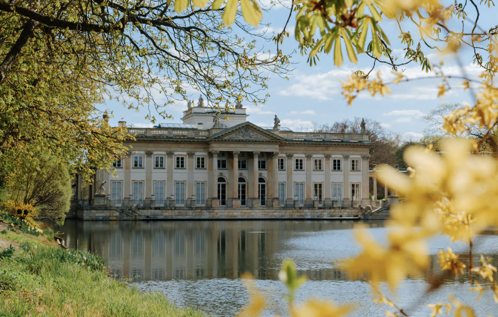 Palace on the Isle in Łazienki Park, Warsaw, framed by spring blossom